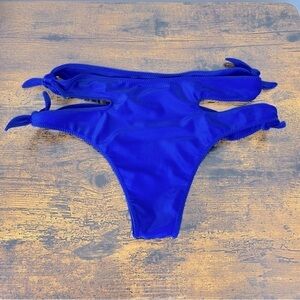 Aila Blue double adjustable side tie cutout blue bikini swim bottom, large.
